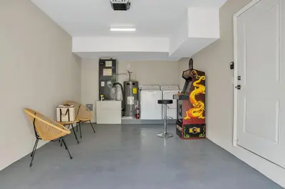 a room with a skateboard and chairs in it at Sistrunk Shades Villa #4 - Townhome Downtown Fort Lauderdale Near Cruise Port & FLL in Fort Lauderdale