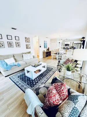 a living room with a couch and a table at Stylish Stay Close to UM City Vibes in Miami