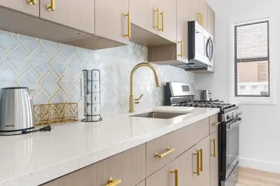 a kitchen with a sink and a stove at 316 Seascape Unit 2 in Hollywood