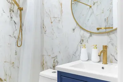 a bathroom with a sink and a mirror at 316 Footloose #1 in Hollywood