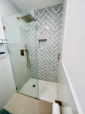 a shower with a glass door in a bathroom at Designer Pool & Family Dream Home in Hollywood