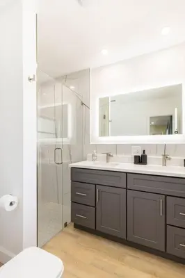 a white bathroom with a sink and a shower at Spacious 4 Bedroom 3 Bathroom House with Heated Pool and Outdoor Shower close to FFL Airport and Cruise Port in Plantation