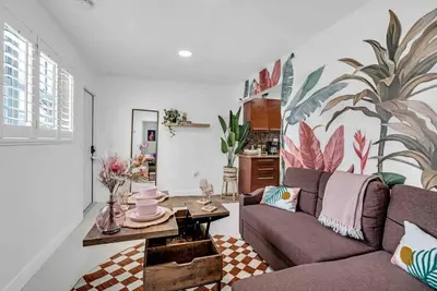 a living room with a couch and a table at Miami Cozy Home! Next to Miami beach & Airport in Miami