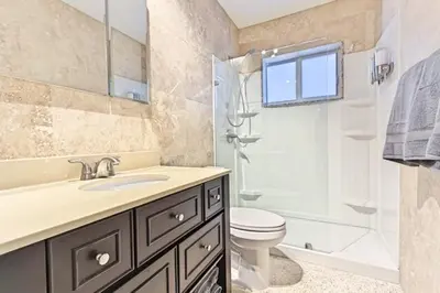 a bathroom with a sink and a toilet and a shower at Wiltonplex C in Fort Lauderdale