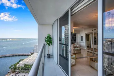 an apartment balcony with a view of the ocean at Gorgeous Bay & City view condo in Brickell with Free SPA in Miami
