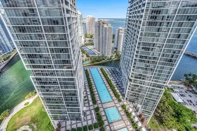 an aerial view of two tall buildings next to the water at Gorgeous Bay & City view condo in Brickell with Free SPA in Miami