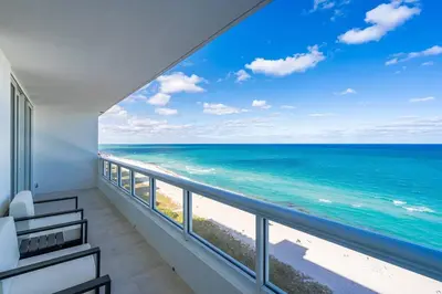 a balcony with a view of the ocean at OceanFront Luxury Penthouse 2 Bedrooms with Direct Ocean View in Miami Beach