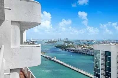 a view of a river from a building at Sin City! Brand new and water view! in Miami
