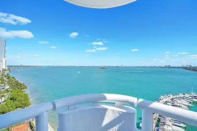 a view of the ocean from the balcony of a condo at Feels Like Summer ~ Panoramic Water Views! in Miami