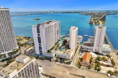 an aerial view of a city with the ocean at Sunset Hideaway! Direct Water Views and Renovated! in Miami