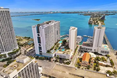 an aerial view of a city with buildings and the water at Pisces Dream - Direct water views! in Miami
