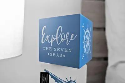 a blue box with the words evolve the seven esses at Hollywood Beachfront Apartment in Hollywood