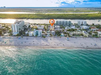 an aerial view of a resort on a beach at Hollywood Beachfront Apartment in Hollywood