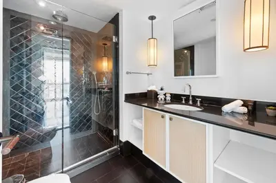 a bathroom with a sink and a shower at THE SETAI 5 STARS HOTEL-RESIDENCE MIAMI BEACH OCEANVIEW 2 Bedroom UNIQUE in Miami Beach
