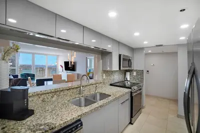 a kitchen with a sink and a counter top at Wildest Dreams Penthouse! Dreams Do Come True in Miami