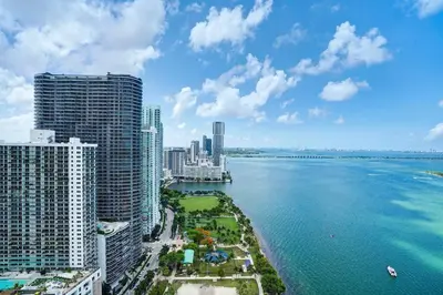a view of the ocean in a city with tall buildings at The Bond - OO7 Vibes and Penthouse Water Views! in Miami