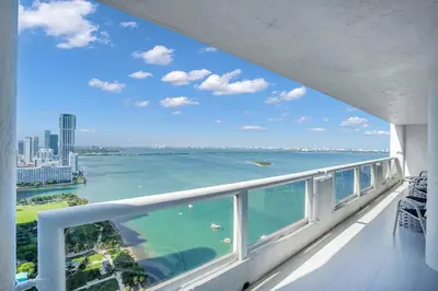 a balcony with a view of the ocean at Superstar! Penthouse with Water and Park Views! in Miami