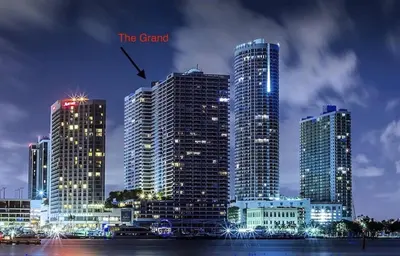 a group of tall buildings in a city at night at Day Dreamer! Water & Miami City Views! in Miami