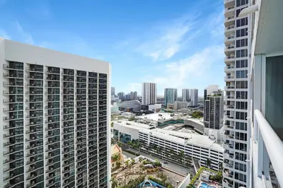 an aerial view of a city with tall buildings at Blue Moon! In the lap of luxury and brand new! in Miami