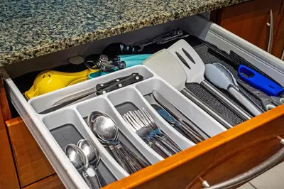 a drawer filled with utensils in a kitchen at Modern Bayview Apartment in Brickell Bay in Miami