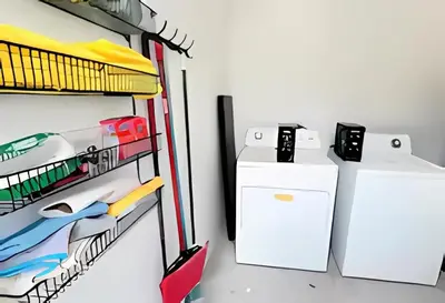 a refrigerator and a washing machine in a room at Gorgeous Private Room, near the Airport - Free parking - 02 in Miami