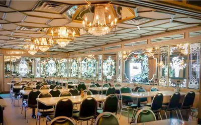 a large room with tables and chairs and chandeliers at Pretty Private Room, near the Airport - Free parking - 02 in Miami
