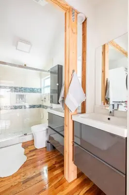 a bathroom with a tub and a sink and a shower at Blue Ocean Vacation Home 2 in Fort Lauderdale