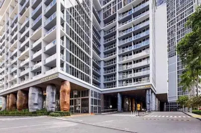a large apartment building with a lot of windows at Icon Luxury 34th Floor Amazing Oceanview, Brickell in Miami