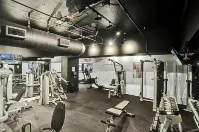 a gym with several treadmills and machines at Modern Ocean View Condo Beach Service Unit 1206 in Miami Beach