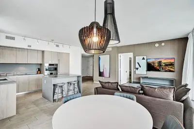 a living room with a couch and a table at 2BR & 2BA Corner Suite Ocean Views at Hyde Beach House in Hollywood
