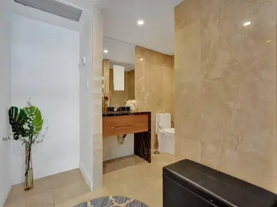 a bathroom with a sink and a toilet in it at Luxury Ocean View Condo Beach and Resort 1216 in Miami Beach