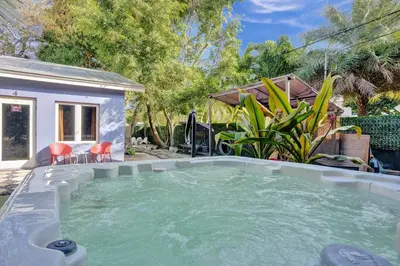 a swimming pool in the backyard of a house at Kiki 1 - Men's Clothing optional Guest Houses in Fort Lauderdale