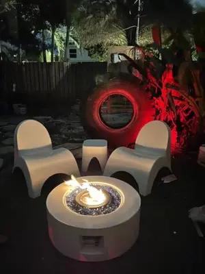 a table with a candle in front of a house at Kiki 3 - Men's Clothing optional Guest Houses in Fort Lauderdale