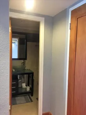 a bathroom with a sink and a mirror at Castle 618 in Miami Beach