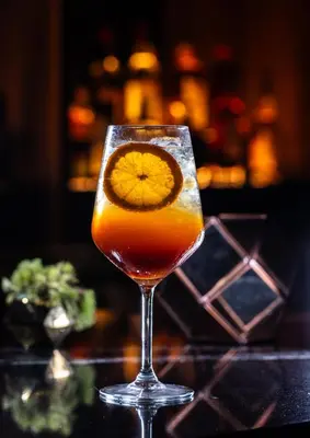 a drink in a glass sitting on a table at Gale Miami Hotel & Residences in Miami