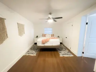 a bedroom with a bed and a ceiling fan at New Miami Boutique, by Calle Ocho and South Beach! in Miami