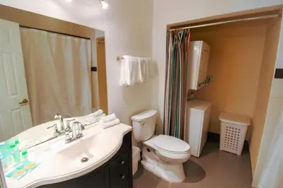 a bathroom with a sink and a toilet and a shower at Castle Ph2 Balcony Oceanfront Condo, Beach Access, Pool, Tennis, Free Parking in Miami Beach
