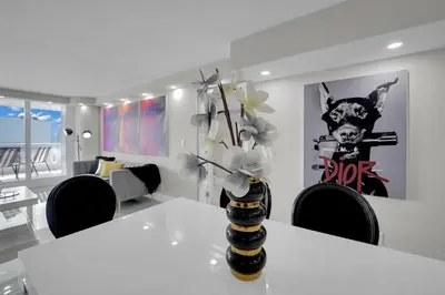 a room with a table with a bumble bee on it at Star Dust! Heart of Miami Dream Stay! 4 BR in Miami