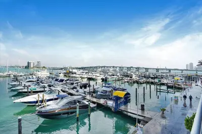 a bunch of boats are docked in a harbor at Star Dust! Heart of Miami Dream Stay! 4 BR in Miami