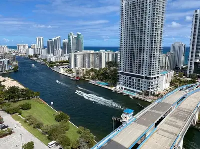 a view of a city with a river and buildings at Feel the Miami Vibe , Cozy & Stylish Studio Stay in Hallandale Beach