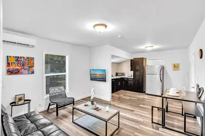 a living room with a couch and a table at Hallandale Mins From Beach & Aventura Mall Hn01 in Hallandale Beach
