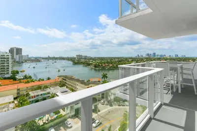 a view of a river from the balcony of a building at Tiffany Ebony - Ocean & Canal views, Walk to Beach in Fort Lauderdale