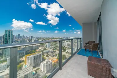 a balcony with a view of a city at Exclusive High-Rise Edgewater 1BD - Tennis & Sauna in Miami