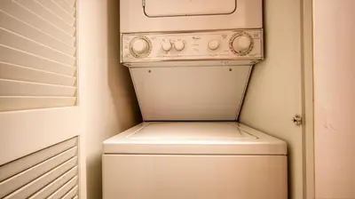 an old washer and dryer in a small bathroom at Beautiful Brickell Miami apt 2BR/2BA + Parking in Miami