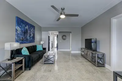 a living room with a couch and a tv at Sunshine Manors 2009 B in Fort Lauderdale