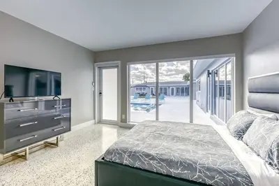 a bedroom with a bed and a large window at Sunshine Manors 2025-B in Fort Lauderdale