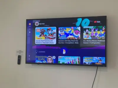 a flat screen tv hanging on a wall at BOOK ME, 3mins Hard Rock Stadium in Miami Gardens