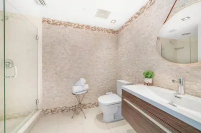 a bathroom with a sink toilet and a mirror at ICON W BRICKELL BY IMD MIAMI Marvelous Ocean View 2BR/2BA in Miami
