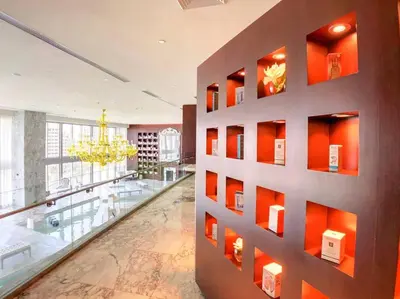 a large room with orange walls and a glass floor at ICON W BRICKELL BY IMD MIAMI Marvelous Ocean View 2BR/2BA in Miami