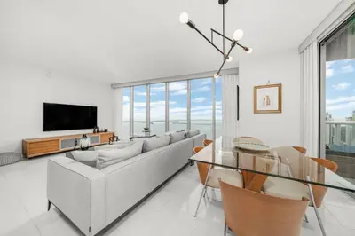 a living room with a couch and a glass table at ICON W BRICKELL BY IMD MIAMI Marvelous Ocean View 2BR/2BA in Miami
